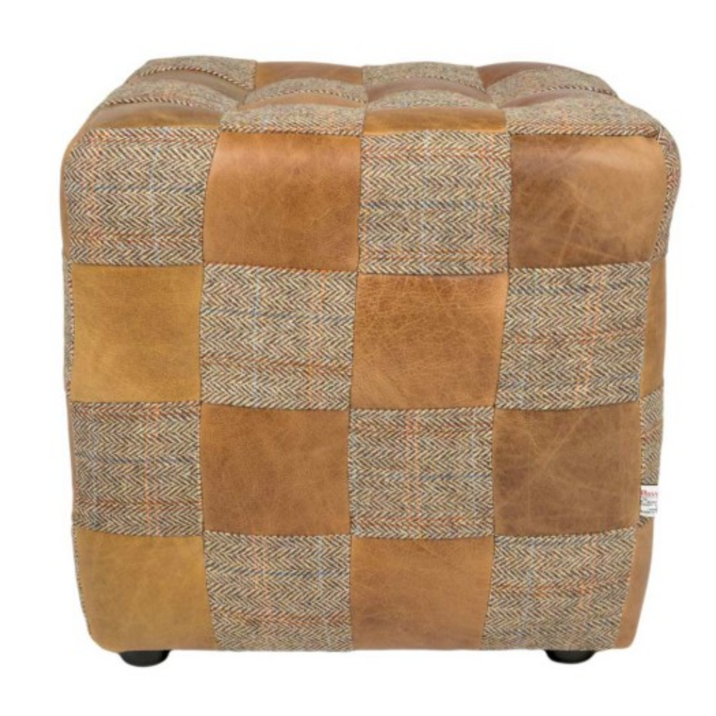 A square patchwork ottoman stool featuring a mix of tan leather and tweed plaid fabric panels, shown against a plain white background.