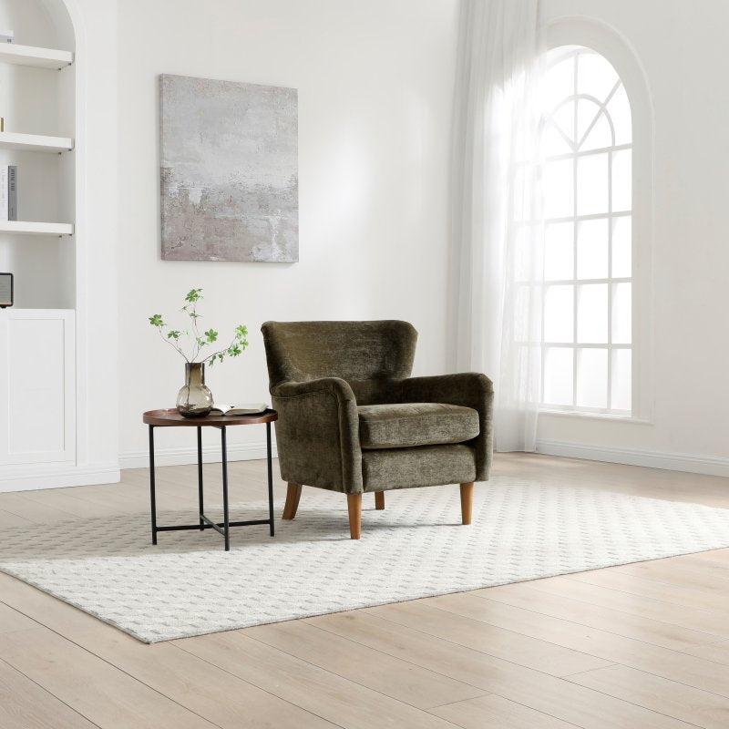 Rosie Navy Chenille Accent Chair styled in a modern interior