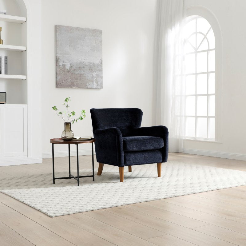 Rosie Navy Chenille Accent Chair in a contemporary living room