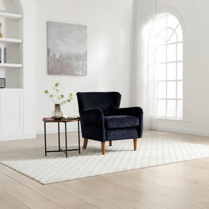 Rosie Navy Chenille Accent Chair in a contemporary living room