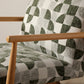 Close up of the green geometric jacquard upholstery