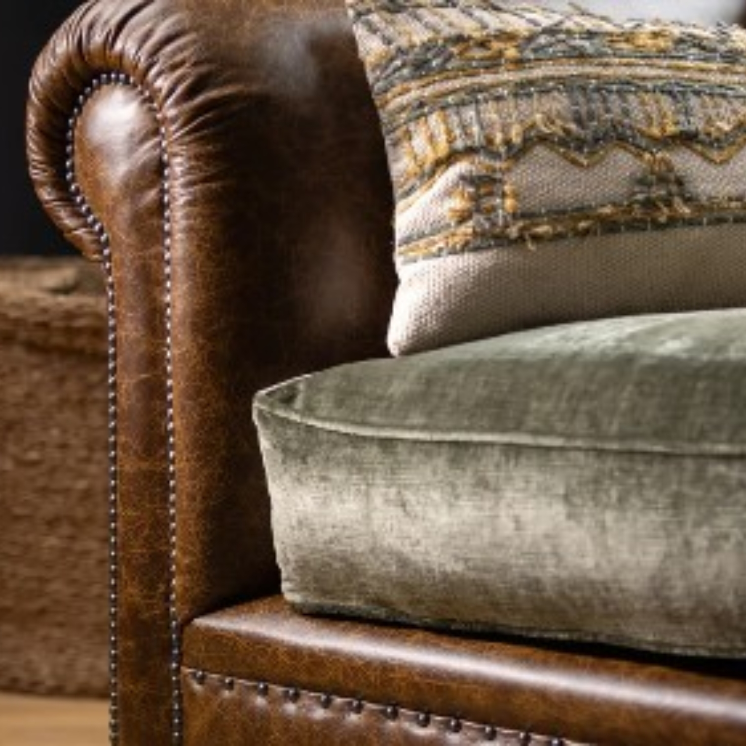 Tetrad Constable Coco Velvet Olive upholstery and Galveston Bark leather detail