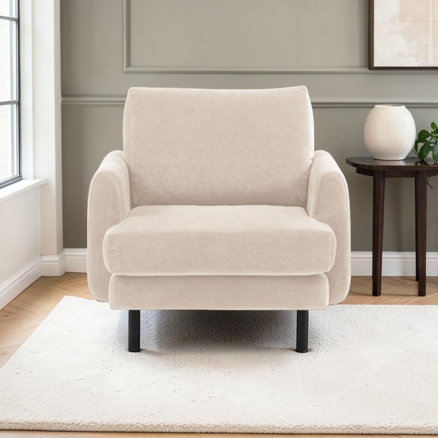 Islington contemporary armchair in Verona Ghost fabric with tapered arms and slim metal legs