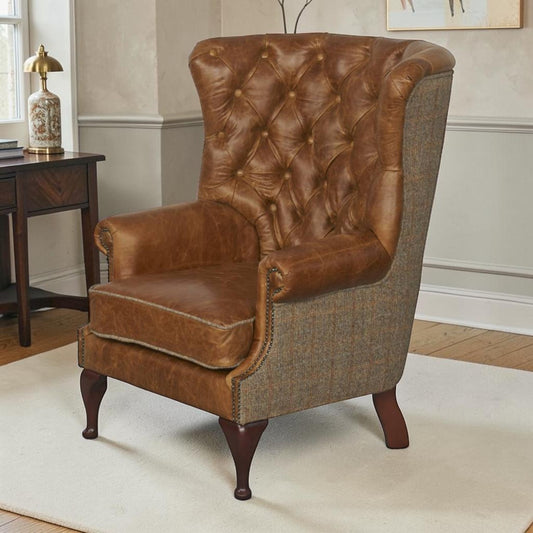 Alnwick wingback chair in Cerato Brown leather and Gamekeeper Tweed with deep-buttoned back and stud detailing