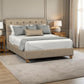 A upholstered bed frame with a tufted headboard and matching footboard, shown in a styled bedroom setting with white bedding, gray pillows, bedside tables, lamps, curtains, and a light rug.