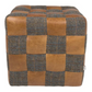 A cube-shaped patchwork pouf or ottoman featuring alternating tan leather and blue-gray Uist Harris tweed wool checks, shown against a plain white background.