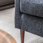Close-up of Henley Charcoal fabric sofa showing the textured upholstery and tapered arm detail
