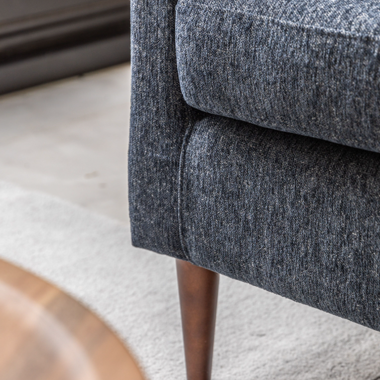 Close-up of Henley Charcoal fabric sofa showing the textured upholstery and tapered arm detail