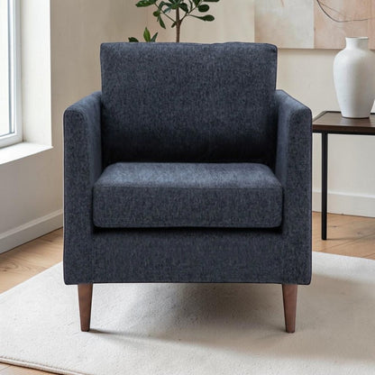 Henley Armchair in Charcoal fabric with deep cushioning, tapered arms and turned wooden legs