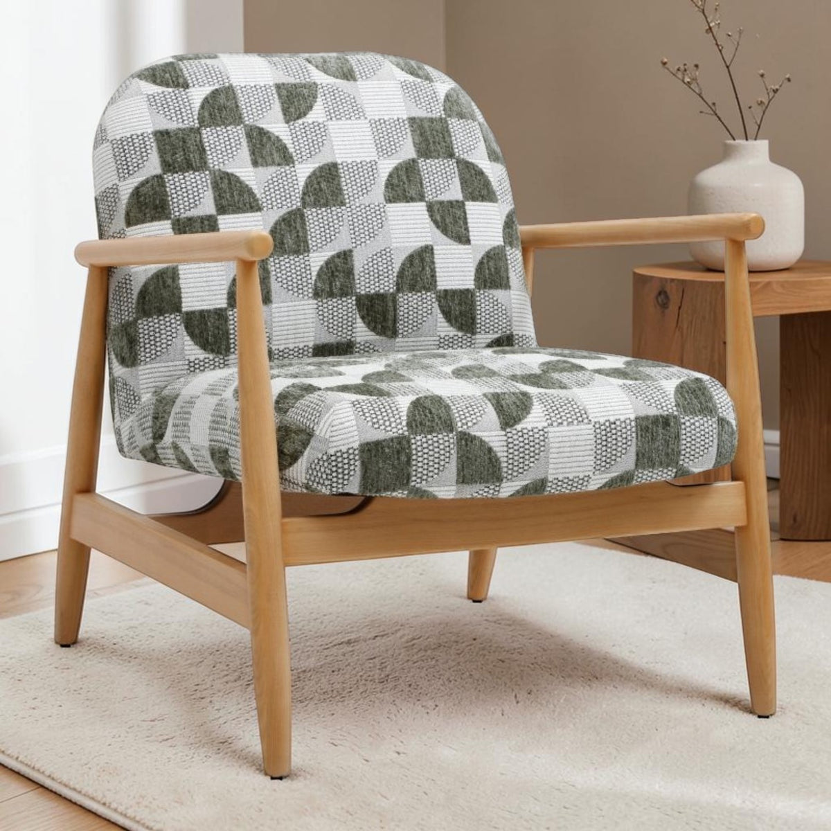 Walter Scandinavian accent chair with light wood spindle frame and green geometric jacquard upholstery